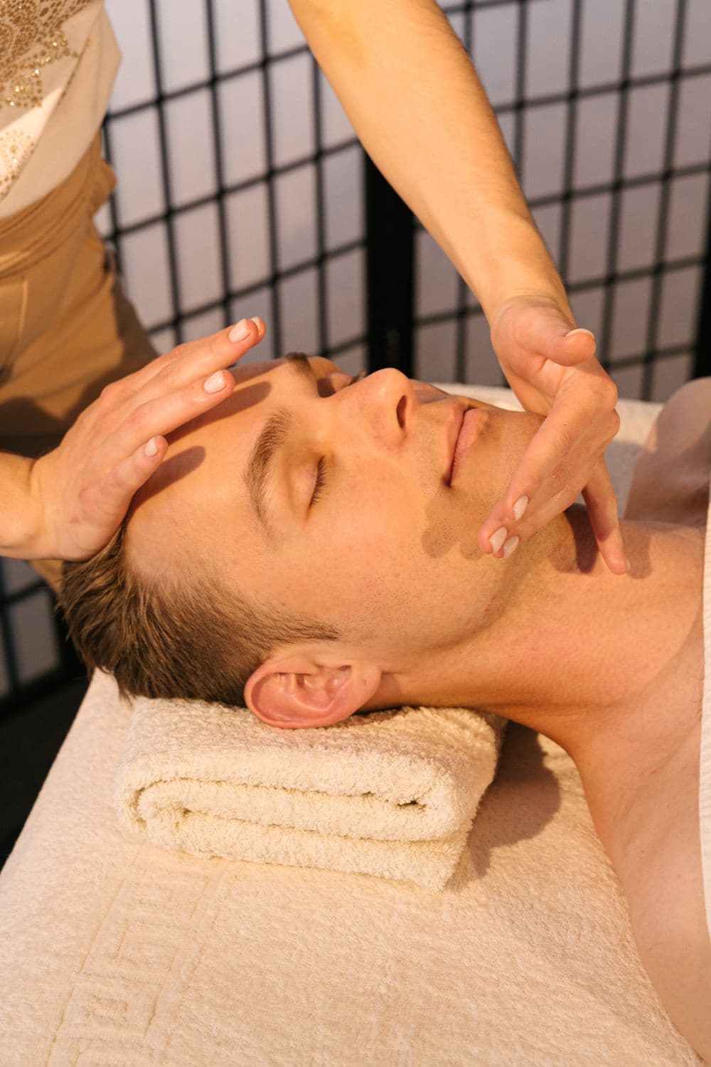Man receiving a treatment at AlphaBelle Wellness